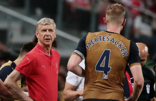 HLV Arsene Wenger bất ngờ trước màn trình diễn của Singapore ảnh 1