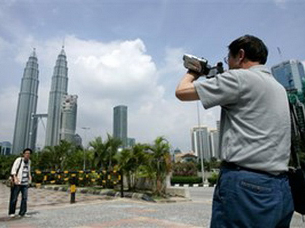 Malaysia tự tin sẽ thu hút 28 triệu khách du lịch năm 2014 ảnh 1