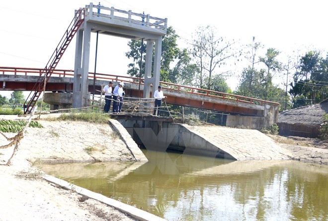 Hệ thống cống ngăn xâm nhập mặn tại Hậu Giang. (Nguồn: TTXVN) Bộ trưởng Cao Đức Phát: Công trình nghìn tỷ chỉ hiệu quả khi khép kín ảnh 1