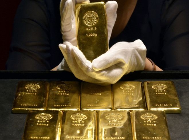 Giá vàng tại thị trường châu Á đi lên phiên đầu tuần 9/1 ảnh 1
