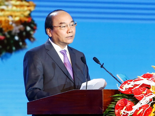 Thủ tướng Nguyễn Xuân Phúc phát biểu tại Lễ kỷ niệm. (Ảnh:Thống Nhất/TTXVN) Phát huy mạnh mẽ nội lực trong mỗi người con quê hương xứ Quảng ảnh 1