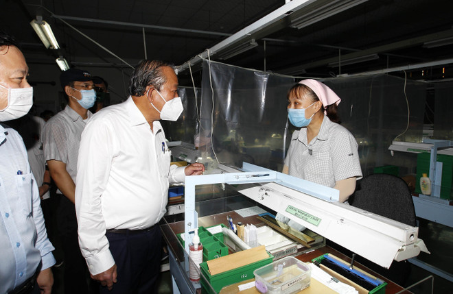 Phó Thủ tướng Trương Hòa Bình kiểm tra công tác phòng dịch ở TP.HCM ảnh 1