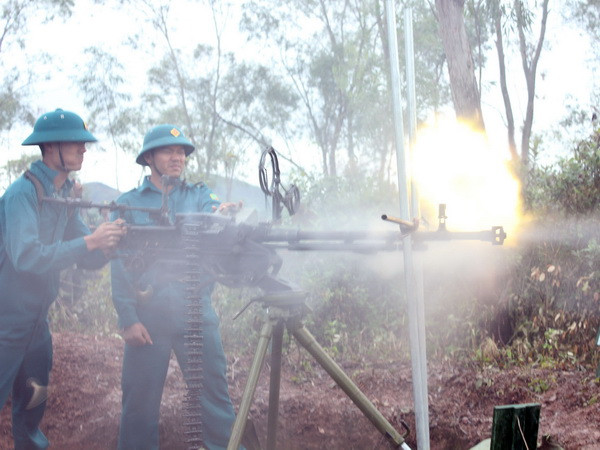 Lực lượng dân quân tự vệ Việt Nam - "bức tường sắt” của Tổ quốc ảnh 1