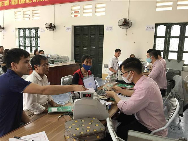 Có dễ giảm lãi vay tiêu dùng khi dịch COVID-19 vẫn phức tạp? ảnh 2