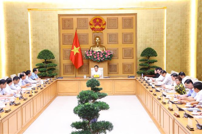 Quang cảnh buổi làm việc. (Ảnh: Văn Điệp/TTXVN) Tháo gỡ khó khăn, đẩy mạnh giải ngân vốn đầu tư công năm 2022 ảnh 1