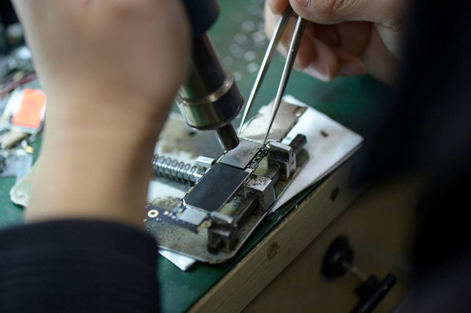 Nở rộ dịch vụ chuyên nâng cấp bộ nhớ trong cho điện thoại iPhone ảnh 2