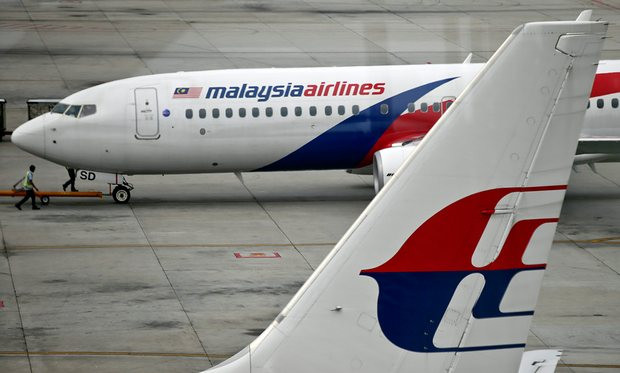 Máy bay Malaysia Airlines gặp sự cố làm một số người bị thương ảnh 1