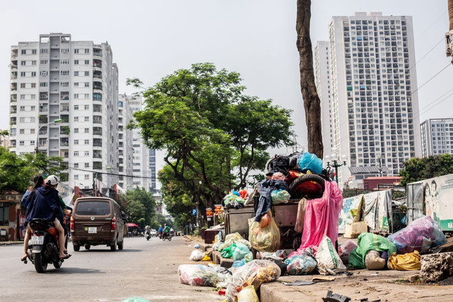 (Ảnh: Nguyễn Phương Thảo/TTXVN Phát) ttxvn_rac_tai_ha_noi_17-2.jpg