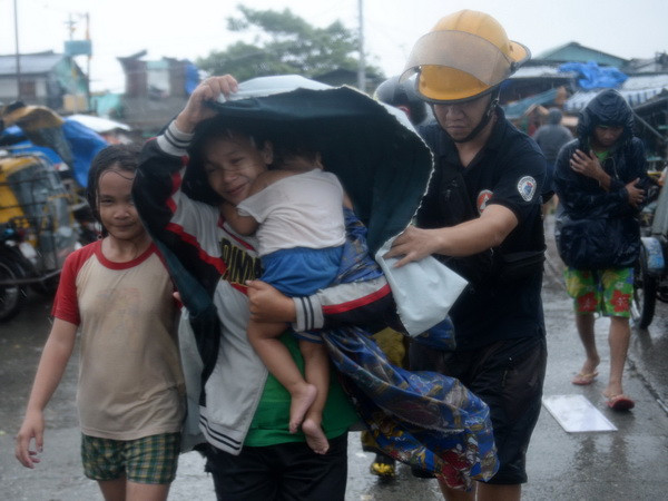 [Photo] Bão Rammasun gây ảnh hưởng nặng nề ở Philippines ảnh 7