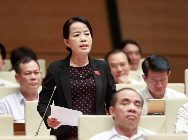 Đại biểu Quốc hội thành phố Đà Nẵng Nguyễn Thị Kim Thúy phát biểu tại thảo luận ở hội trường về dự án Luật Đấu thầu (sửa đổi) vào chiều 23/5 tại Kỳ họp thứ 5, Quốc hội khóa XV. (Ảnh: Doãn Tấn/TTXVN) Bộ trưởng Tài chính lý giải vì sao không đưa giá điện vào diện bình ổn ảnh 1
