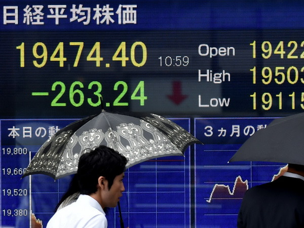 Các sàn chứng khoán châu Á biến động trái chiều lúc mở phiên ảnh 1