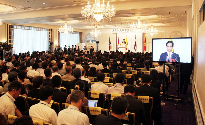 Thủ tướng Nguyễn Tấn Dũng gặp cộng đồng người Việt Nam tại Nhật ảnh 2