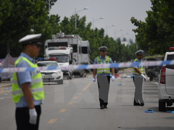 Cảnh sát Trung Quốc. (Nguồn: AFP/TTXVN) Chuyên gia: Trung Quốc “do dự” trong cuộc chiến chống khủng bố ảnh 1