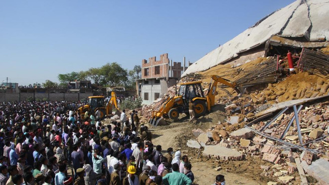 Rò rỉ khí đốt khiến cả tòa nhà đổ sập, gần 20 người thương vong ảnh 1