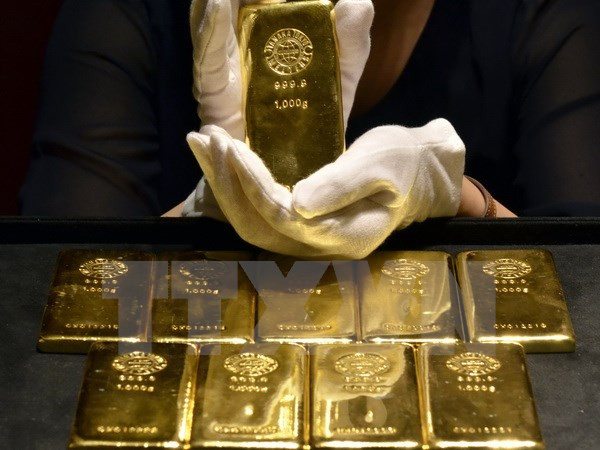 Vàng rời khỏi mức thấp trong 6 năm sau quyết định của Fed ảnh 1