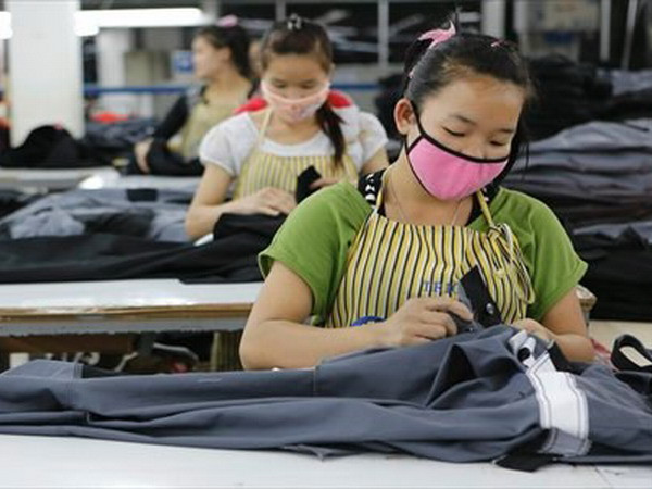 Lào: Vientiane cấp phép tạm thời cho lao động nước ngoài ảnh 1