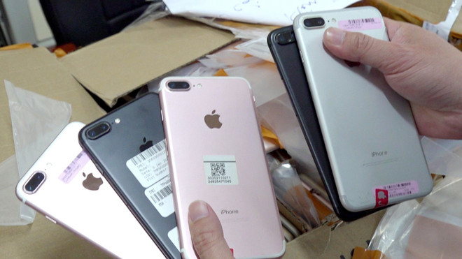 Tạm giữ hàng trăm điện thoại iPhone qua sử dụng không rõ nguồn gốc ảnh 1