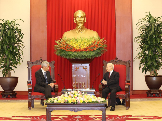 [Photo] Tổng Bí thư Nguyễn Phú Trọng tiếp Thủ tướng Singapore ảnh 3