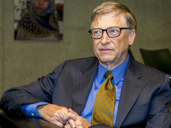 Tỷ phú Bill Gates. (Nguồn: AFP/TTXVN) Tỷ phú Bill Gates kêu gọi ông Donald Trump tiếp bước Kennedy ảnh 1