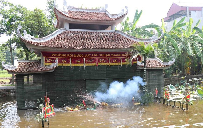 Màn biểu diễn Tứ linh của phường múa rối nước Đồng Ngư, xã Ngũ Thái (Thuận Thành, Bắc Ninh). (Ảnh: Diệp Trương/TTXVN) Bảo tồn và phát huy giá trị văn hóa nghệ thuật múa rối nước Đồng Ngư ảnh 1