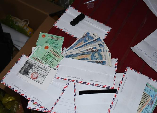 Bắt giữ cặp vợ chồng scan tiền mệnh giá 5.000 đồng để tiêu thụ ảnh 1