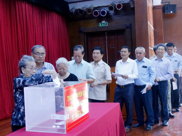 Đại sứ quán Việt Nam tại Lào tổ chức ủng hộ nạn nhân thiên tai ảnh 1