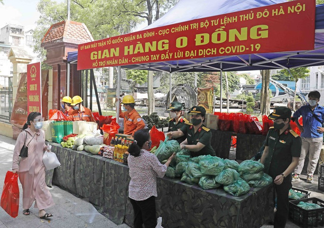 "Gian hàng 0 đồng" trong những ngày giãn cách ở Hà Nội. (Ảnh: Trần Việt/TTXVN) Chủ tịch MTTQ Việt Nam: Để Tết Nhâm Dần mang dấu ấn của lòng nhân ái ảnh 1
