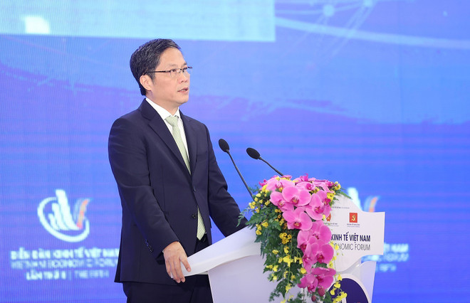Trưởng Ban Kinh tế Trung ương Trần Tuấn Anh phát biểu. (Ảnh: Dương Giang/TTXVN) Khai mạc phiên toàn thể Diễn đàn Kinh tế Việt Nam lần thứ 5 ảnh 2