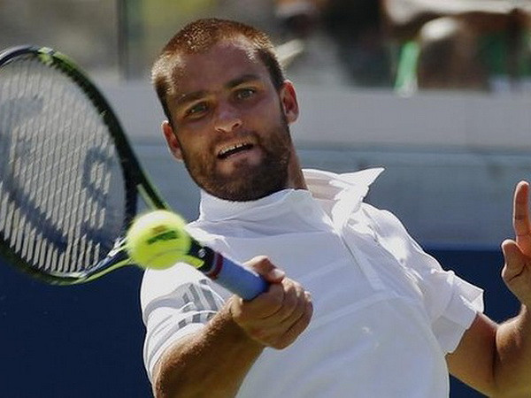 US Open 2014: Hạt giống bắt đầu rơi rụng trong ngày ra quân ảnh 1