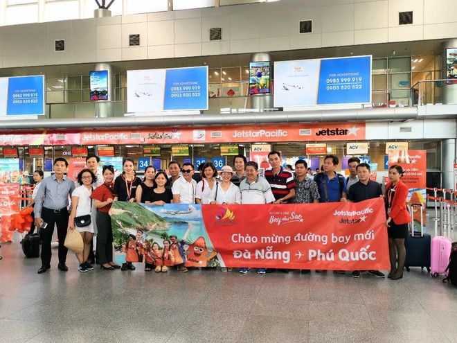 Hành khách đi trên chuyến bay của Jetstar Pacific từ Đà Nẵng-Phú Quốc. (Ảnh: Tiến Sỹ) Jetstar Pacific mở đường bay mới từ Đà Nẵng tới Phú Quốc và Thanh Hóa ảnh 1