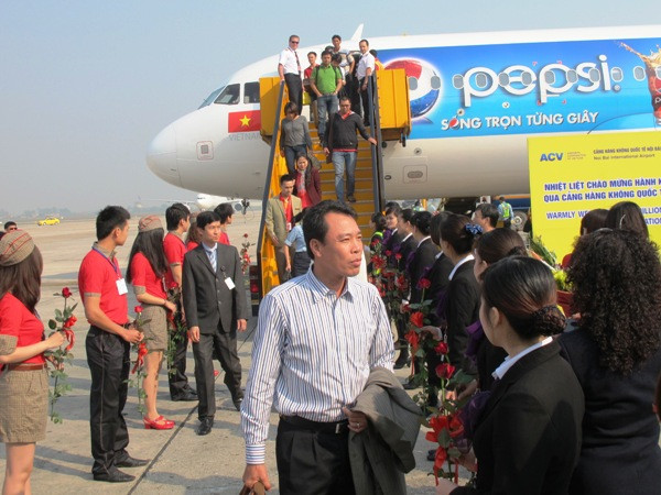 Cảng hàng không Nội Bài đón hành khách thứ 12 triệu ảnh 1