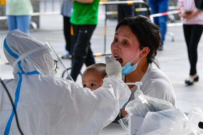 Trung Quốc dỡ bỏ phong tỏa một phần thành phố Thâm Quyến ảnh 1