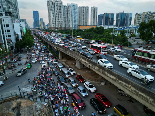 Tuyến đường vành đai tại đô thị giúp giảm ùn tắc và mở ra không gian phát triển cho địa phương. (Ảnh minh họa: PV/Vietnam+) duong vanh dai do thi.jpg