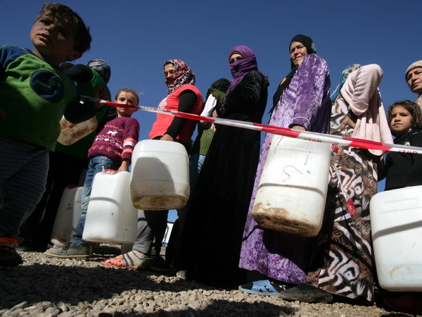 Gánh nặng y tế từ dòng người tị nạn Iraq và Syria ảnh 1