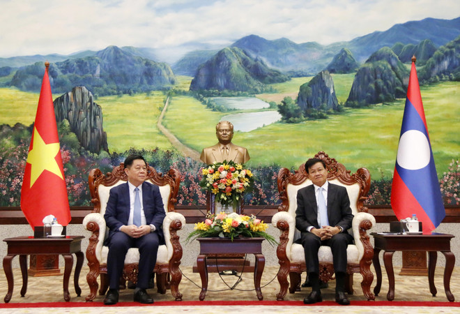 Tổng Bí thư, Chủ tịch nước Lào Thongloun Sisoulith tiếp ông Nguyễn Trọng Nghĩa và đoàn. (Ảnh: Phạm Kiên/TTXVN) Tổng Bí thư, Chủ tịch nước Lào tiếp đoàn đại biểu ĐCS Việt Nam ảnh 2