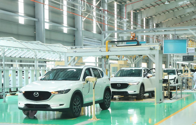Thực hiện mục tiêu kép 'vừa quyết liệt phòng, chống dịch hiệu quả, vừa tập trung phục hồi và phát triển kinh tế, đảm bảo an sinh xã hội và trật tự xã hội.' (Ảnh: TTXVN) 10 sự kiện nổi bật của ngành tài chính trong năm 2020 ảnh 1