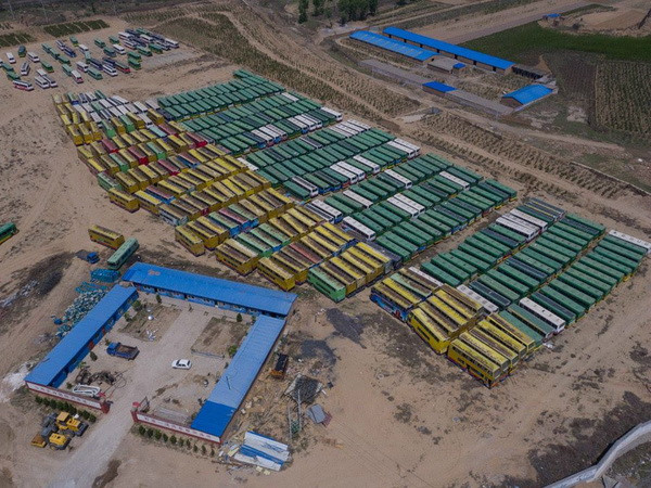 Trung Quốc: Xe buýt ra "nghĩa địa" nhường chỗ cho xe điện ảnh 1