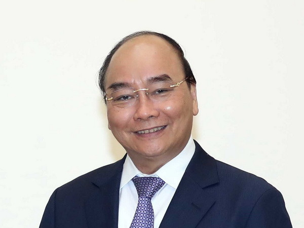 Thủ tướng Nguyễn Xuân Phúc. (Ảnh: Thống Nhất/TTXVN) Thủ tướng Nguyễn Xuân Phúc lên đường làm việc tại Hàn Quốc ảnh 1