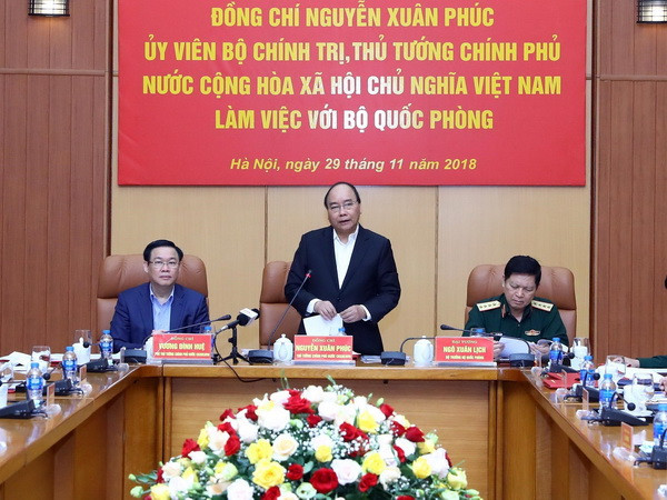 Thủ tướng Nguyễn Xuân Phúc làm việc với lãnh đạo Bộ Quốc phòng. (Ảnh: Thống Nhất/TTXVN) Thủ tướng Nguyễn Xuân Phúc làm việc với lãnh đạo Bộ Quốc phòng ảnh 1