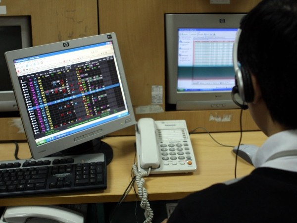 Ảnh minh họa. (Nguồn: TTXVN) Mã BAD tăng kịch trần bảy phiên liên tiếp, VN-Index cộng 10 điểm ảnh 1