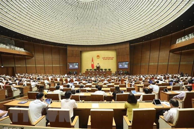 Quang cảnh một phiên họp của Kỳ họp thứ 9, Quốc hội khóa XIV. (Ảnh: Văn Điệp/TTXVN) Thông qua Nghị quyết thí điểm cơ chế đặc thù với thành phố Hà Nội ảnh 1