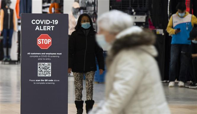 Tỉnh đông dân nhất Canada bỏ quy định đeo khẩu trang ở nơi công cộng ảnh 1
