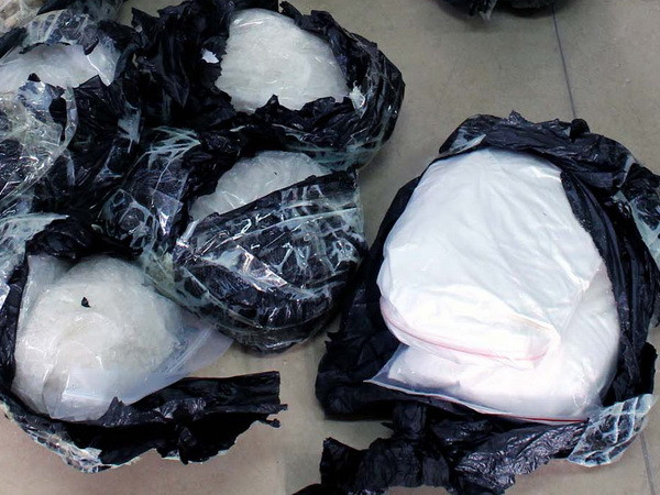 Bắt đối tượng vận chuyển 2 bánh heroin từ Hà Nội vào Cần Thơ ảnh 1