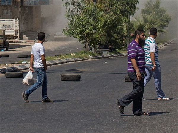 Cận cảnh đau thương về sự sống và cái chết song hành ở Gaza ảnh 7