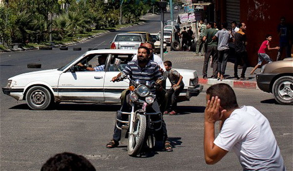 Cận cảnh đau thương về sự sống và cái chết song hành ở Gaza ảnh 2