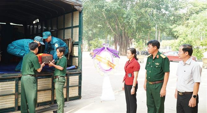 Đưa 83 hài cốt liệt sỹ quân tình nguyện và chuyên gia Việt Nam về nước ảnh 1