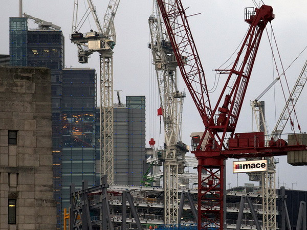 Tăng trưởng kinh tế của Anh trở lại mức trước khủng hoảng ảnh 1