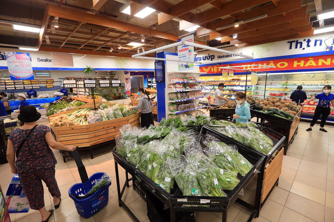 Tổ chức sản xuất, phân phối để bình ổn giá hàng hóa thiết yếu ảnh 1