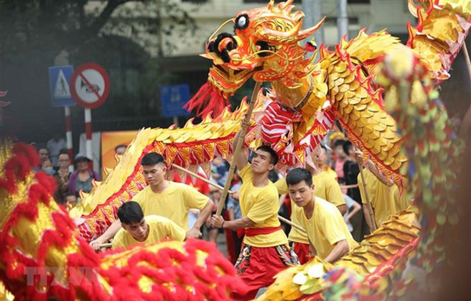 (Ảnh: Thanh Tùng/TTXVN) Phát triển văn hóa, con người Việt Nam đáp ứng phát triển đất nước ảnh 1