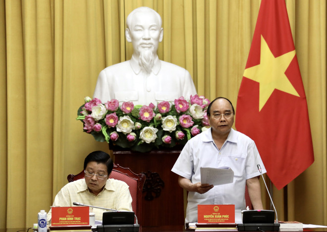 Chủ tịch nước Nguyễn Xuân Phúc phát biểu. (Ảnh: Lâm Khánh/TTXVN) Chủ tịch nước chủ trì làm việc về Đề án xây dựng Nhà nước pháp quyền ảnh 1